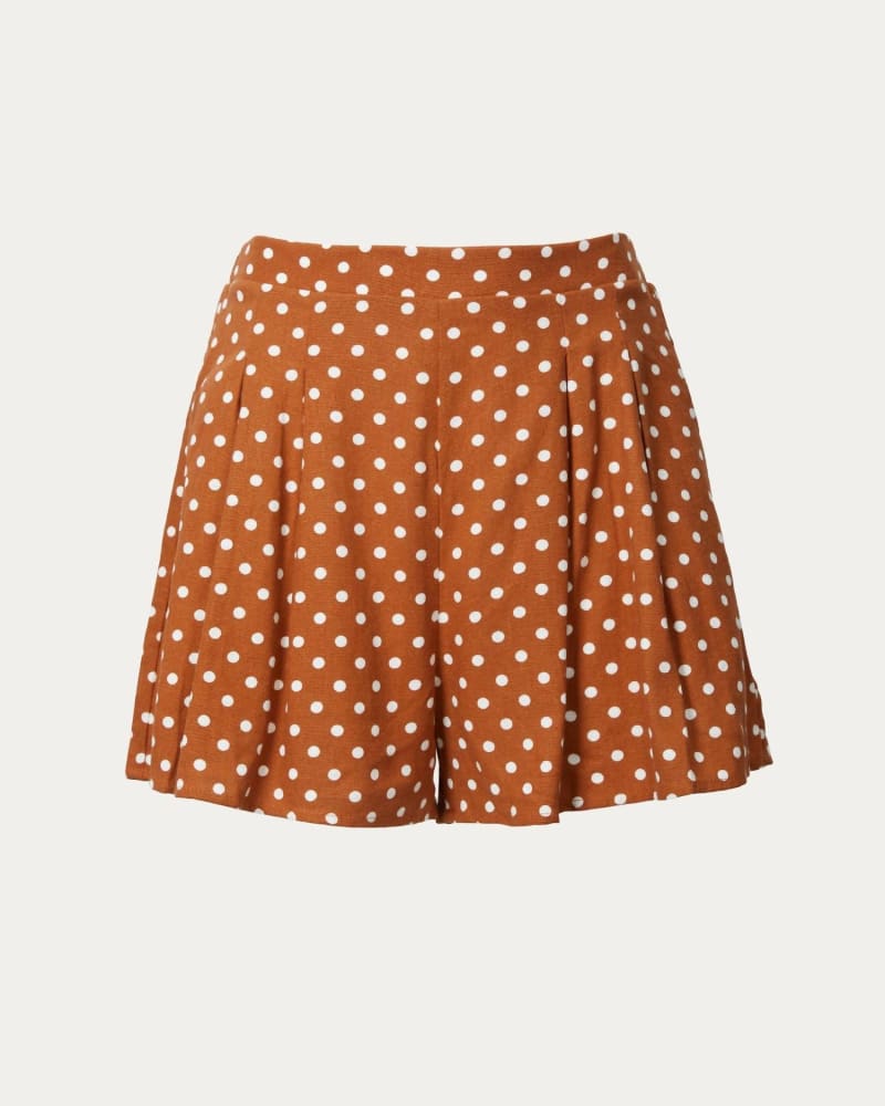 Front of a model wearing a size L Polka Dot High-Rise Pleated Shorts In Camel in Camel by By Together. | dia_product_style_image_id:358361